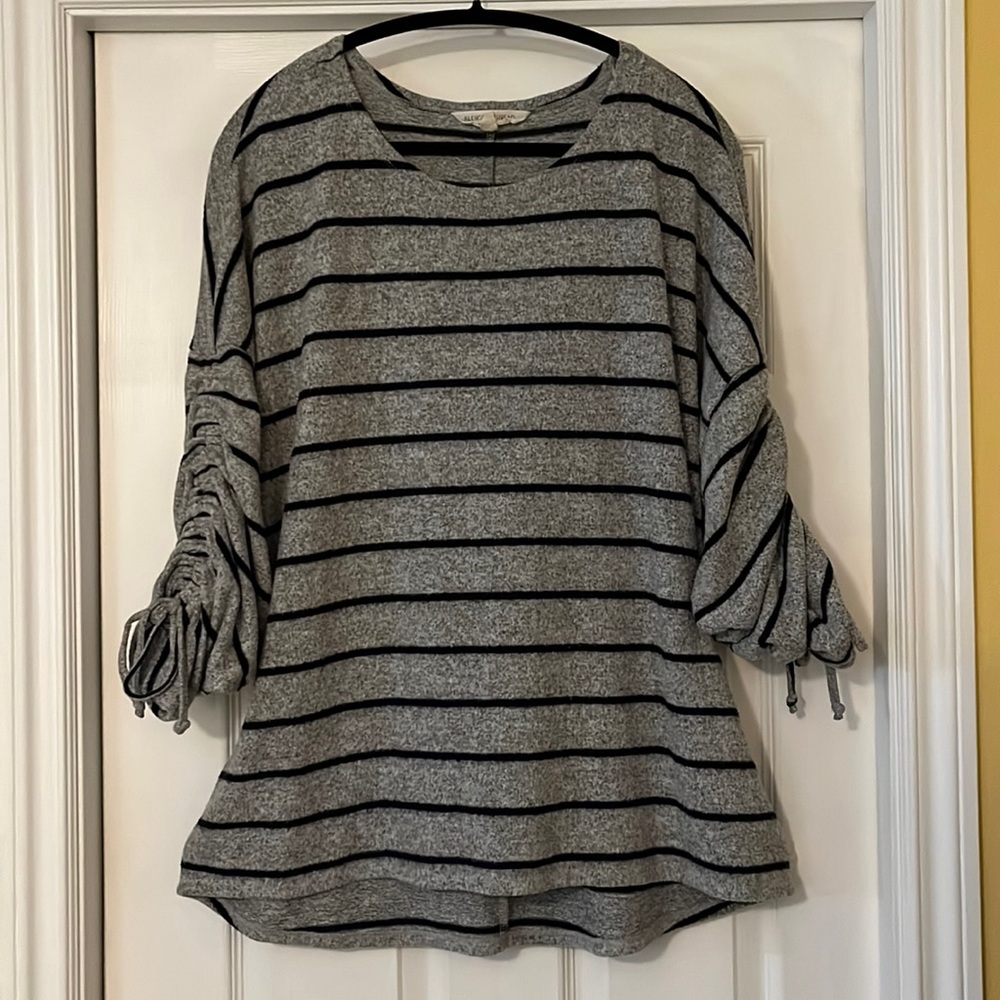 Soft, Fuzzy Top With Fun Rouched Sleeves!